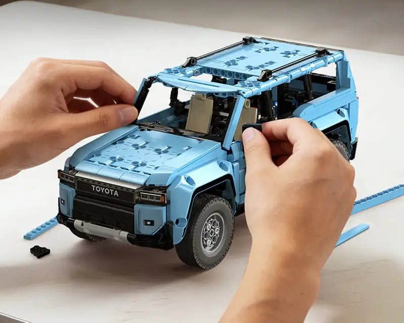 CaDa C51209W Land Cruiser Prado - 586pcs building blocks set - view 7 | Power Blockz